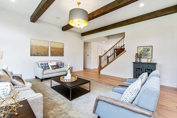 Wyndham Living Room - 1.5 Story House Plans in MO